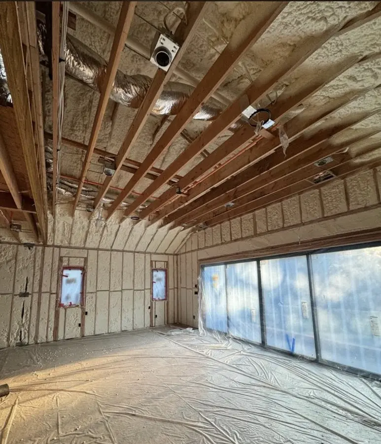 Interior walls and ceiling insulated with spray foam during new construction in Mission